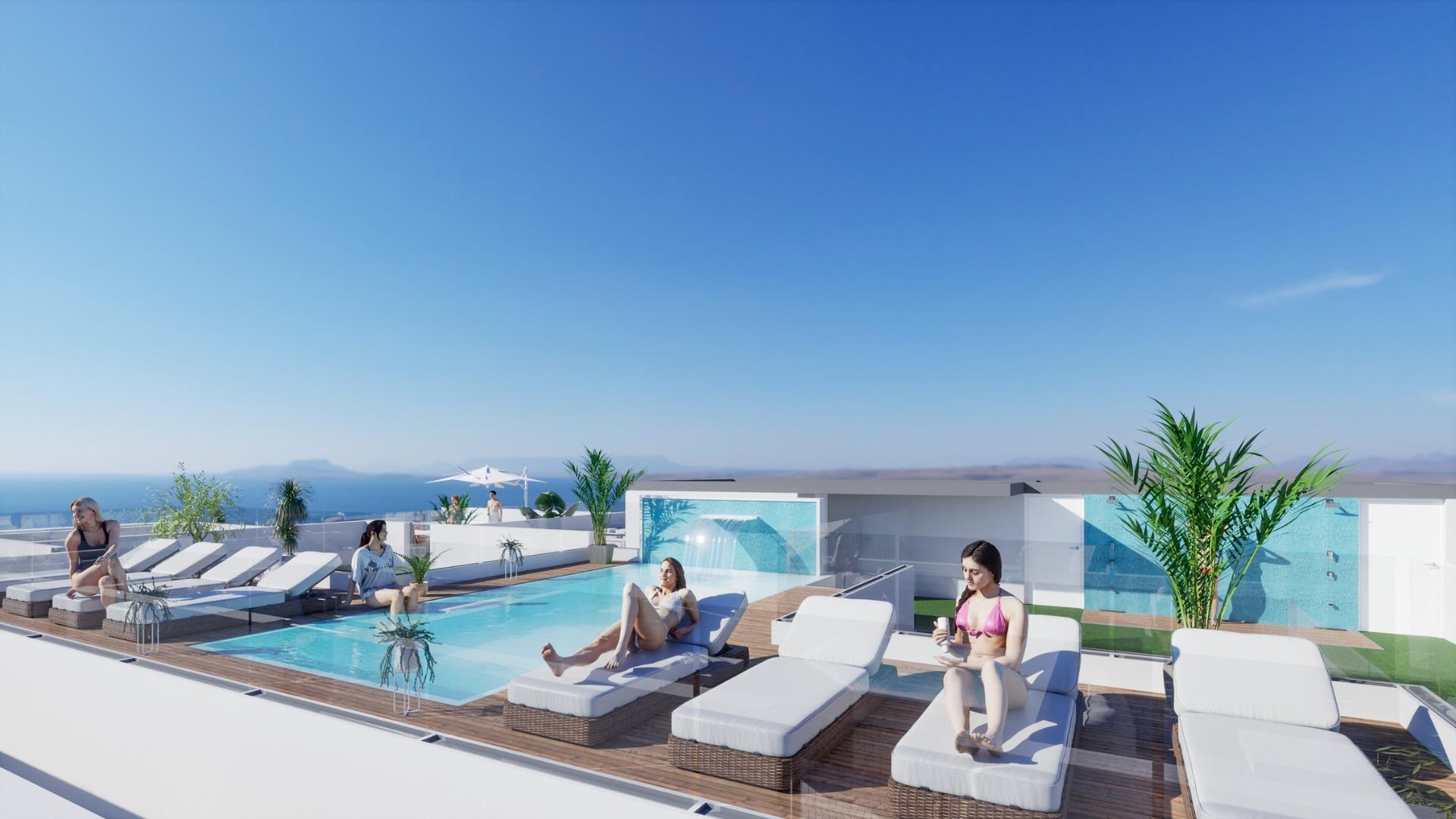 ATICOS DE OBRA NUEVA EN TORREVIEJA Nueva construcción de diseño vanguardista de cinco plantas en Torrevieja con 34 viviendas exclusivas ofrece una variedad de opciones de vida, desde elegantes ap...