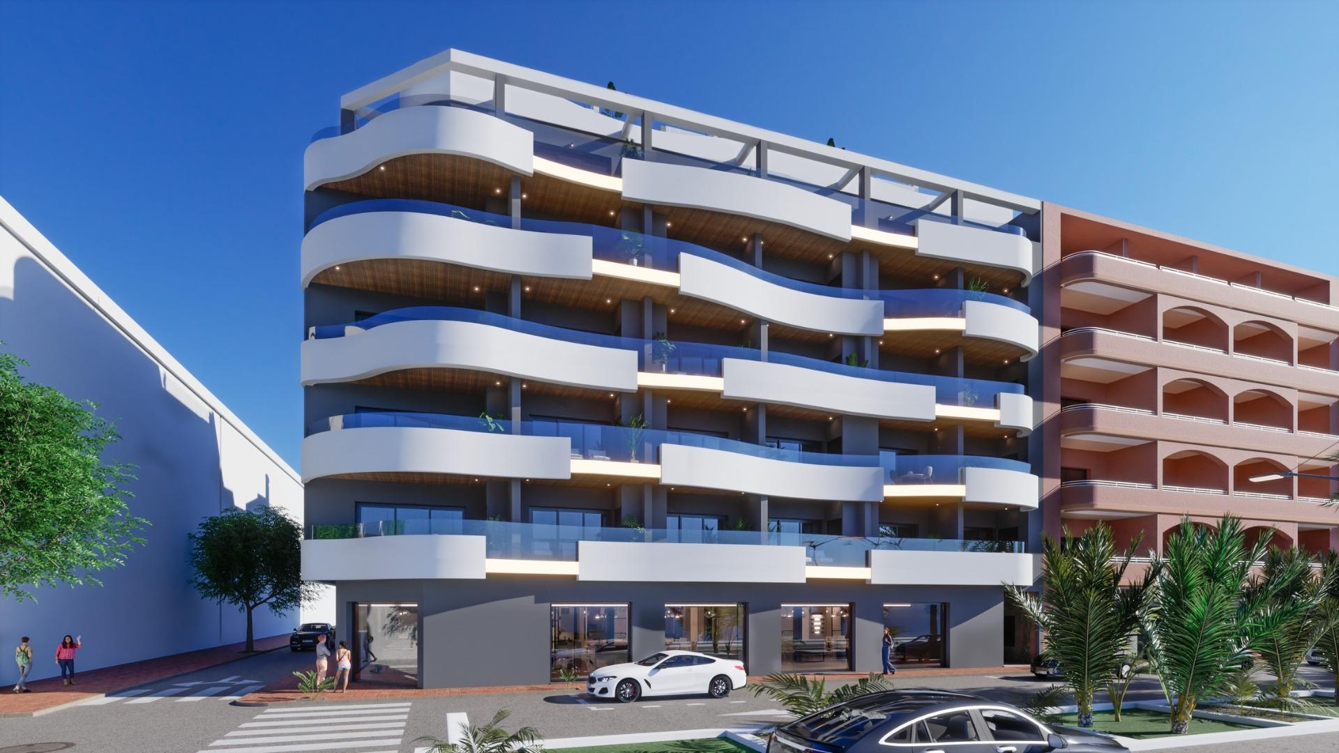 ATICOS DE OBRA NUEVA EN TORREVIEJA Nueva construcción de diseño vanguardista de cinco plantas en Torrevieja con 34 viviendas exclusivas ofrece una variedad de opciones de vida, desde elegantes ap...