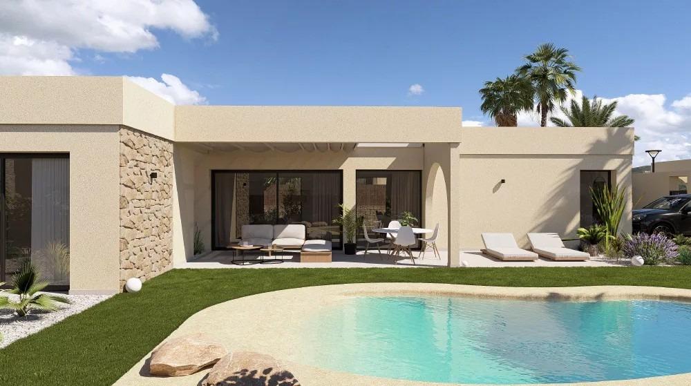 Modern beige house with a curved pool in the foreground and a patio with seating nearby.