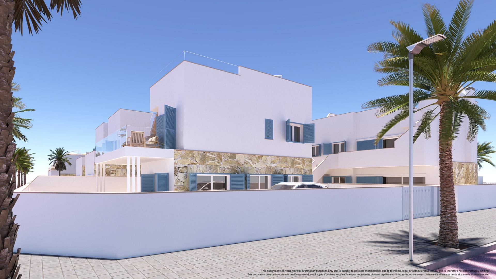 White modern Mediterranean building with blue shutters, stone accent wall, and palm trees along a paved street under a clear blue sky.