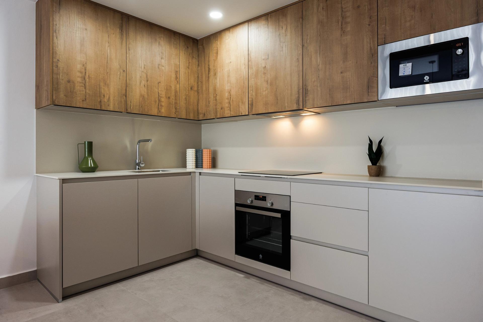 Apartamento en Venta en Villajoyosa, Inversión en Villajoyosa: 8 apartamentos obra nueva con licencia turística. Cerca del mar, 2 hab, terraza-jardín. ¡Sin comunidad! Alto potencial alquiler.