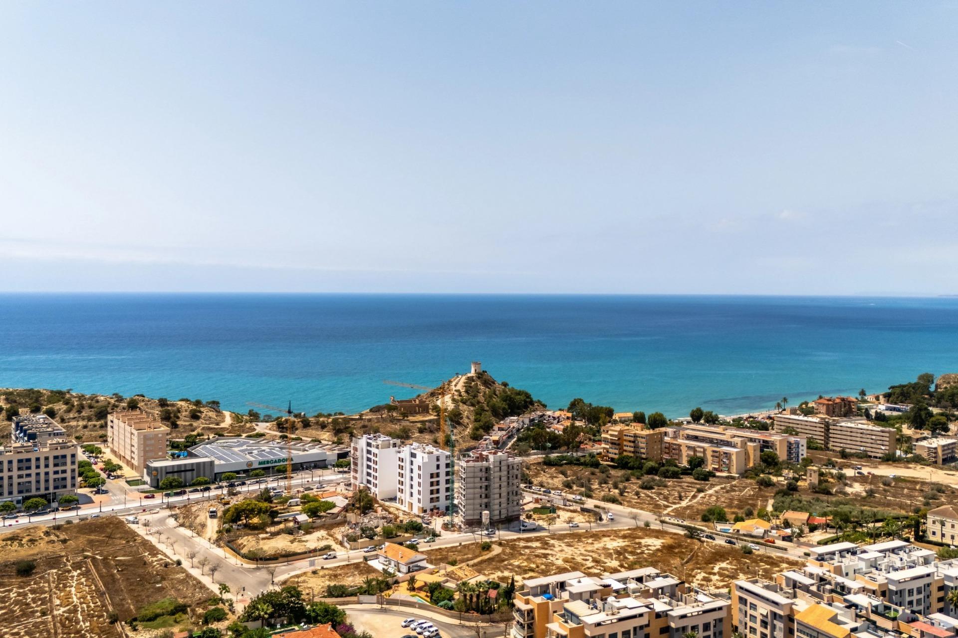 Apartamento en Venta en Villajoyosa, Inversión en Villajoyosa: 8 apartamentos obra nueva con licencia turística. Cerca del mar, 2 hab, terraza-jardín. ¡Sin comunidad! Alto potencial alquiler.
