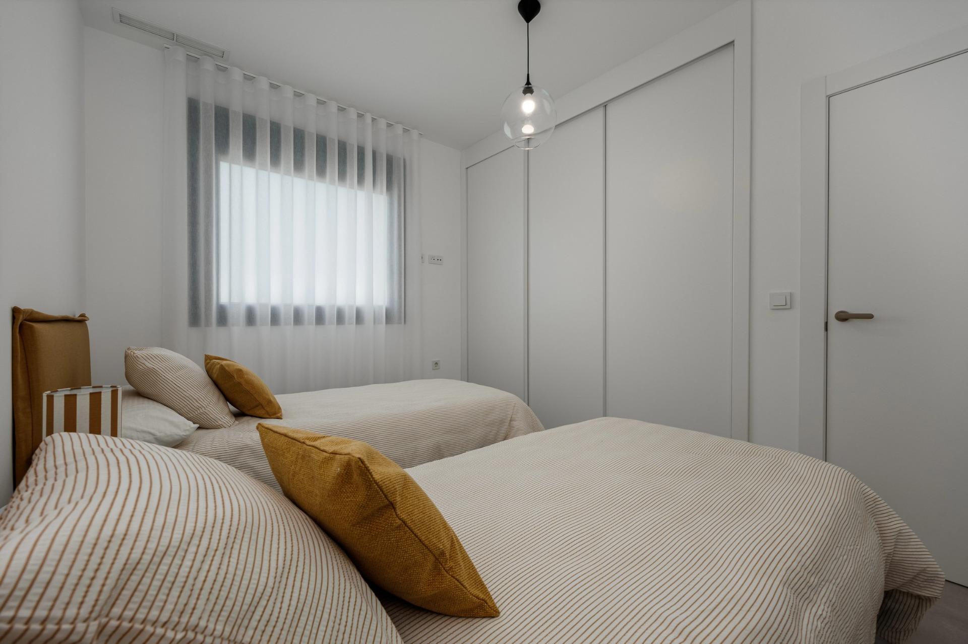 Apartamento en Venta en Villajoyosa, Inversión en Villajoyosa: 8 apartamentos obra nueva con licencia turística. Cerca del mar, 2 hab, terraza-jardín. ¡Sin comunidad! Alto potencial alquiler.