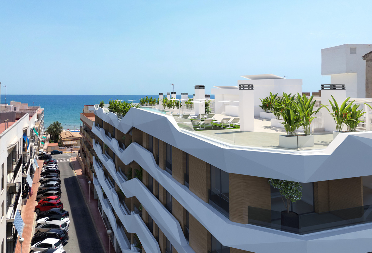 Moderno Apartamento en Guardamar: Playa, Piscina y Confort, Apartamento de lujo en Guardamar del Segura, a 100m de la playa. 2 hab, 2 baños, piscina en azotea, domótica y cocina equipada. ¡Vive el Mediterráneo!