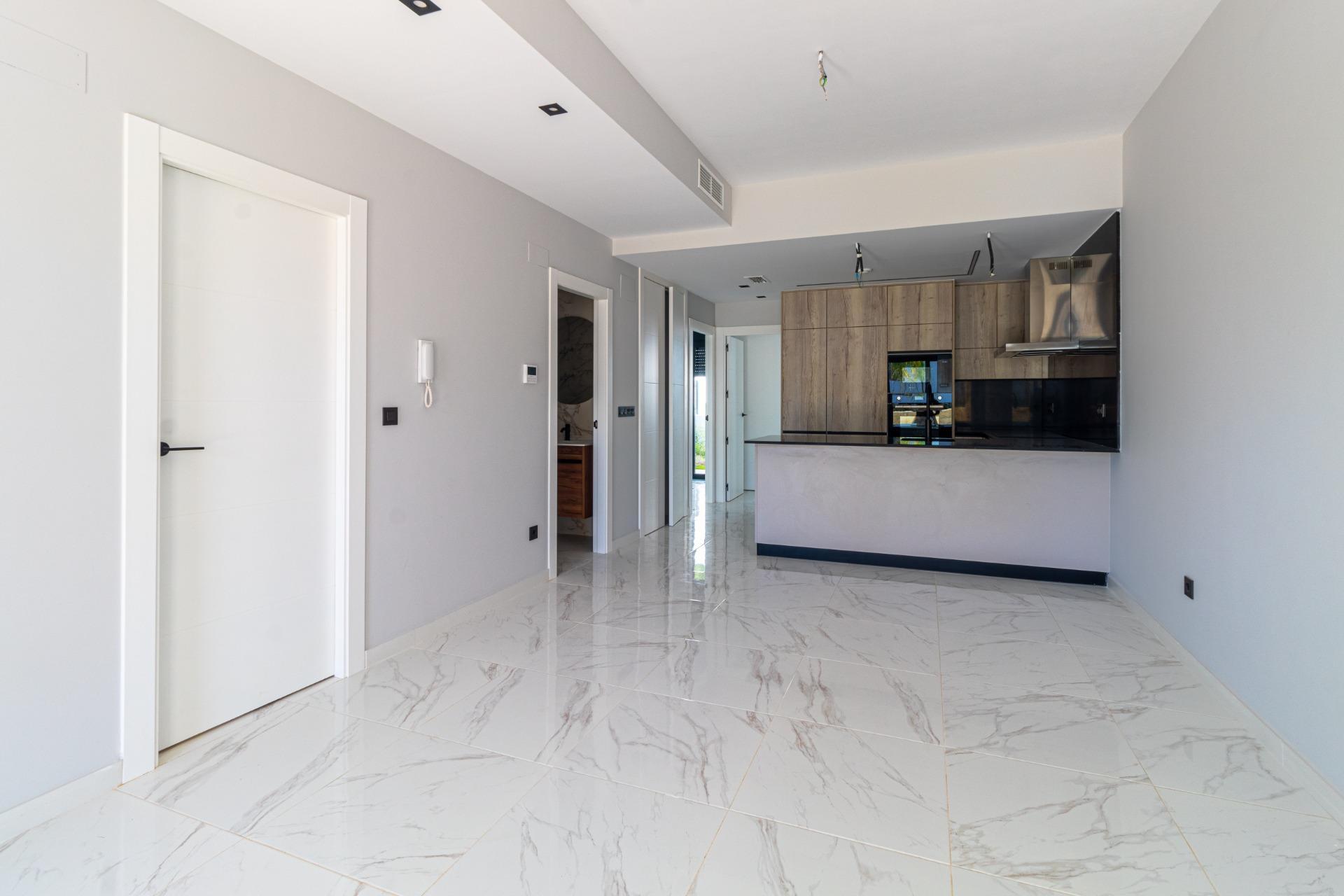 Estrena Apartamento Moderno en Orihuela Costa: Tu Estilo, Tu Vida, Estrena apartamento en planta baja en Innova Beach III, Orihuela Costa. 3 dorm, 2 baños, jardín con piscina. Cerca de playas y servicios. ¡Tu vida mediterránea