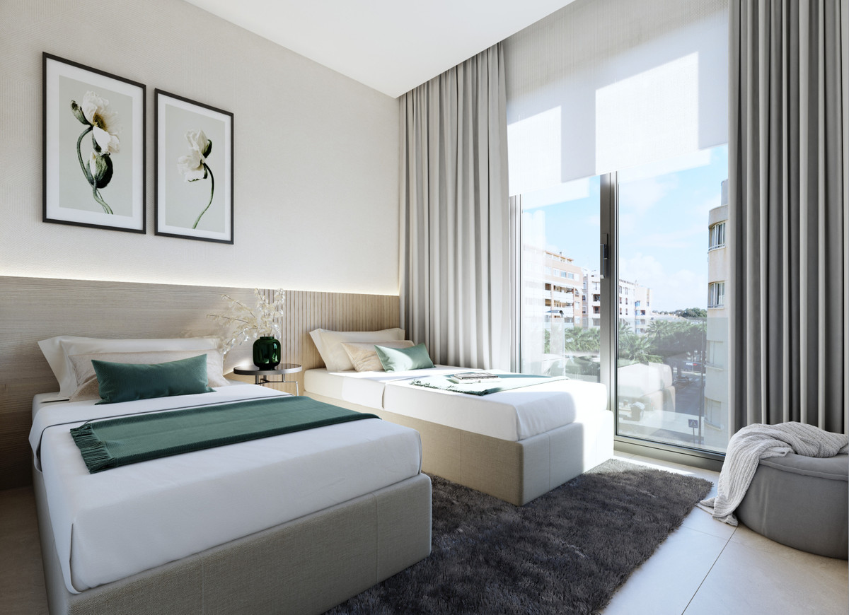 Moderno Apartamento en Guardamar: Playa, Piscina y Confort, Apartamento de lujo en Guardamar del Segura, a 100m de la playa. 2 hab, 2 baños, piscina en azotea, domótica y cocina equipada. ¡Vive el Mediterráneo!